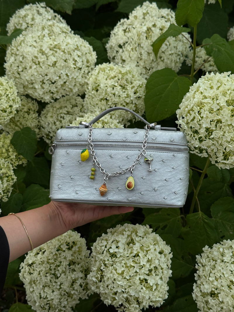 light blue ostrich-textured handbag